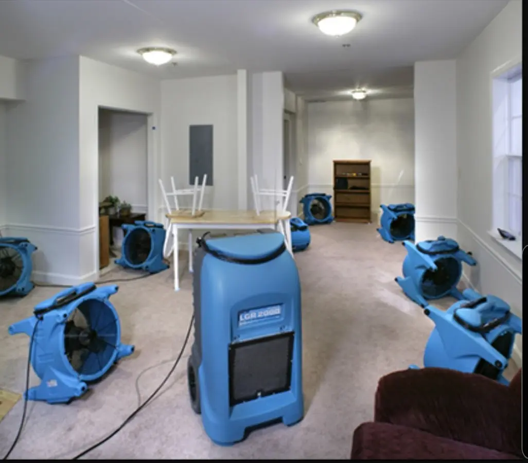 Air movers and dehumidifier setup for Water Damage Restoration in Concord